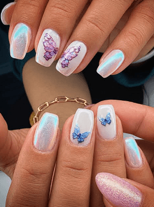 Pearl aurora gel nails with hand-painted butterflies